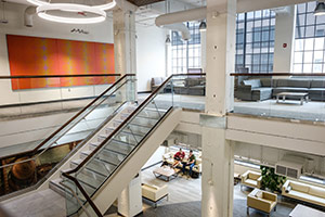 View of upstairs and downstairs lounge areas.