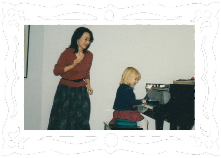 Kathryn learning the piano.