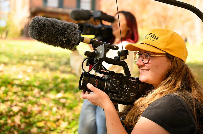 Wake Forest University Documentary Film Program students learn about cinematography and sound design during a class at the Brookstown Inn.