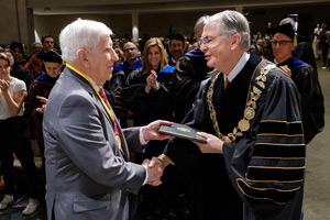 Charley Rose receiving the Medallion of Merit