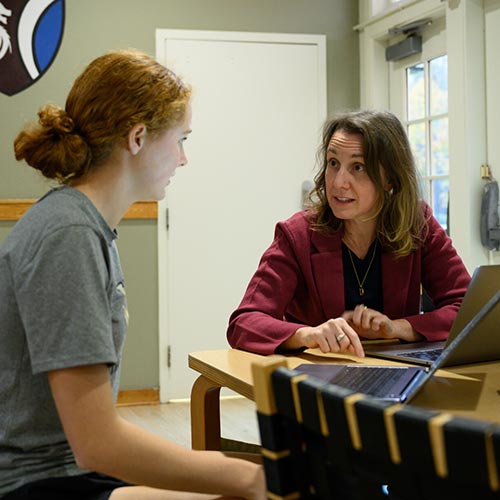 Assistant Teaching Professor, Department of Counseling Dr. Nikki Elston, the Assistant Dean of Academic Advising helps a student determine what classes she should register for during a Faculty Fellows advising session at Collins Residence Hall.