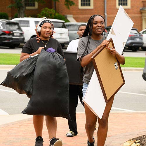 First-year and transfer students moving into their residence halls on Move-In Day