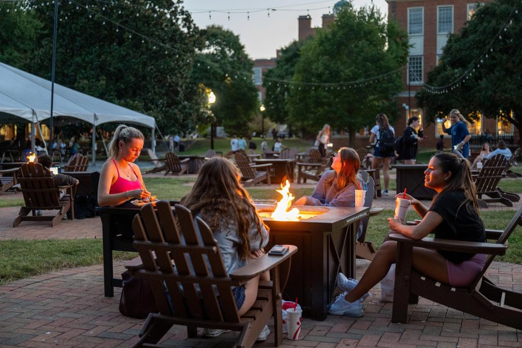 Wake Forest University Students enjoying the evening on campus.