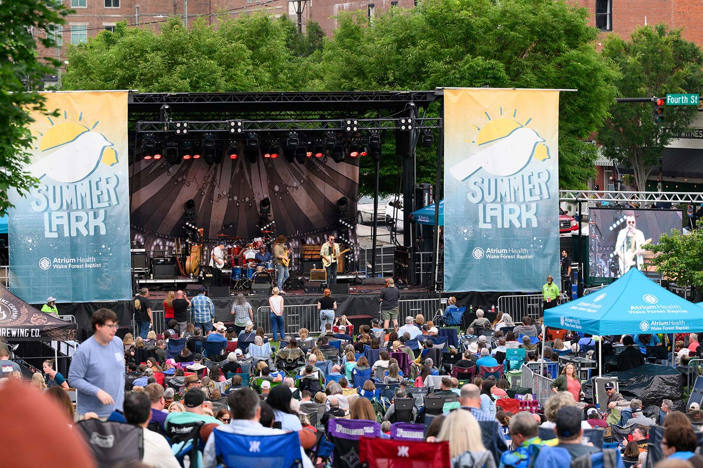 Thousands of people gather at Bailey Park in Downtown Winston-Salem for SummerLark with Old Crow Medicine Show.