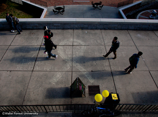 Yellow Ribbon on Sidewalk