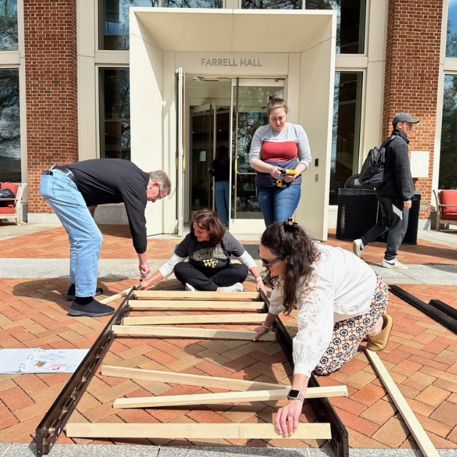 Business Professor Douglas Johnson integrates service in leadership course