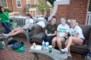 Students want Hit the Bricks from a couch pulled onto the Quad.