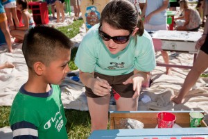 Wake Forest students participate in Discovering Education through Student Knowledge (D.E.S.K.), an annual community service project whose goal is to provide desks, chairs, and school supplies for children in the Winston-Salem community who are in need of a place to study and learn in their homes. The students paint their assigned desks on Manchester Plaza.