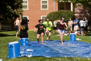 Wake Forest students set up a homemade sliding pool on the grass outside Bostwick Residence Hall on Thursday, April 23, 2009.