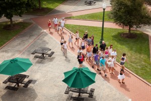 Potential students and their families tour the campus of Wake Forest University led by a tour guide from the Office of Admissions on Wednesday, July 25, 2012.