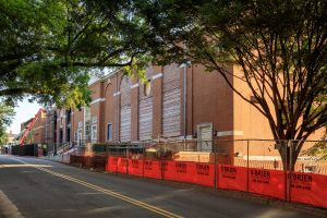 orange construction fencing as the Reynolds Gym renovation happens