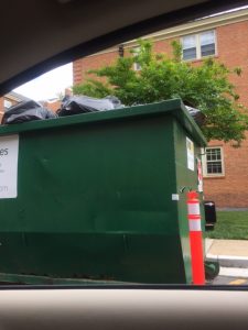 Dumpsters filled to the brim as students move out