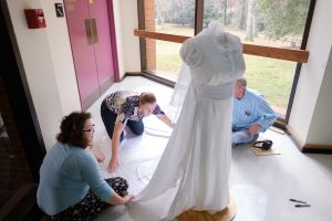 Wake Forest senior art major Casidy Howard ('17) works on her sculpture project in the hallway of Scales Fine Arts Center on Wednesday, November 30, 2016. Her sculpture is a commentary on the reactions Casi received on her wedding.