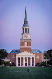 The bell tower of Wait Chapel rises above the Wake Forest campus early on the morning of Wednesday, October 18, 2017.