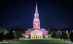 The bell tower of Wait Chapel rises above the Wake Forest campus early on the morning of Wednesday, October 18, 2017.