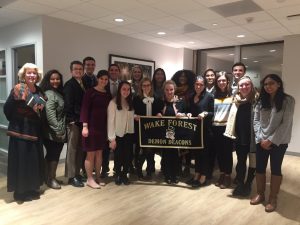 The Wake Washington Students and Dr. Harriger pose for a photo with former-Secretary of State Madeline Albright