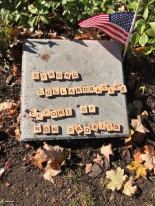 Mysterious Scrabble tile cement slab seen on the Quad