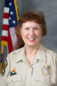 Police head shots. Nancy Via.