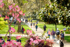 Wake Forest students walk across Manchester Plaza to class on Thursday, April 12, 2018.