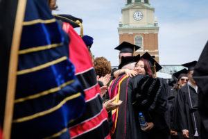 Wake Forest University holds its Commencement Ceremony on Hearn Plaza on Monday, May 21, 2018. Graduates walk through a gantlet of faculty members as they march in the recessional.
