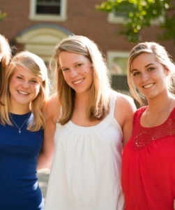 Wake Forest freshmen Hope Davis (in red), Lauren Krahnert (in blue), and Ally Landuyt (in white), share a suite together in Luter Residence Hall. They are hanging out outside the residence on Tuesday, April 28, 2009.