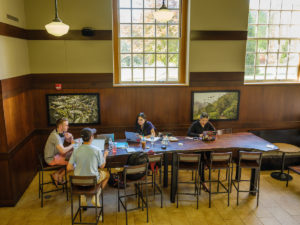 Students work at a large table in the Starbucks inside the Z. Smith Reynolds Library on Wednesday, April 24, 2019.