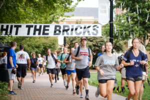 Members of the Wake Forest community raise money for cancer research in the annual Hit the Bricks for Brian event on Hearn Plaza on Thursday, September 26, 2019. The event is named for Brian Piccolo, and teams run laps on the quad to raise money.