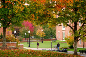 Fall color is starting to show on the Wake Forest campus as students walk between Magnolia and Dogwood Residence halls early on the morning of Monday, October 28, 2019.