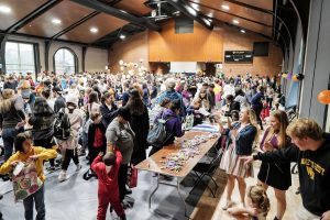 Wake Forest students host local elementary school students for trick-or-treating during the annual Project Pumpkin service project, held this year in the Sutton Center gymnasium on Wednesday, October 30, 2019.