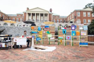 Students and faculty commemorate the 30th anniversary of the falling of the Berlin Wall by hosting a graffiti contest and their own destroying of the wall on Friday, October 25, 2019.