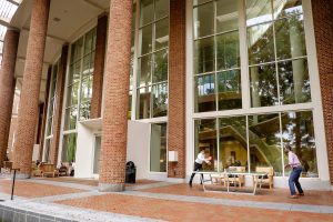 Wake Forest business students Rahul Ramachandran, left, and Brandon Barfield play table tennis outside Farrell Hall during a break between their graduate classes on Tuesday, October 14, 2014.