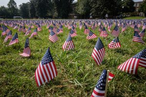 Memorial flags fly on Manchester Plaza in honor of the 9/11 anniversary on Wednesday, September 11, 2019.