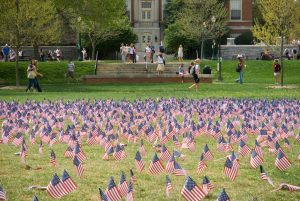 Wake Forest students walk past flags on Manchester Plaza, part of an anti-war protest on April 3, 2007.