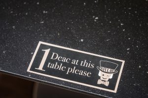 A sign allowing one person per study table greets law students at the Wake Forest School of Law on Wednesday, August 12, 2020.
