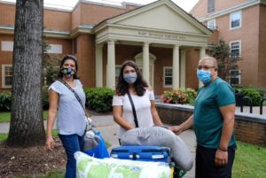 A new student and family move in to Collins Hall