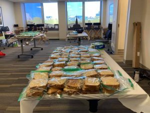 Wake Washington students and alumni made sandwiches for Martha's Table, serving those in need