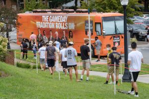 Wake Forest students line up to take selfies in front of the ESPN College Gameday tour bus on north campus, on Thursday, September 10, 2020. College Gameday will broadcast from Truist Field on Saturday.