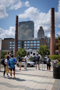 Wake Forest students wait for a shuttle bus back to the main campus, at Wake Downtown on Friday, September 11, 2020.