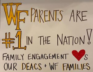 Office of Family Engagement's sign for College Gameday