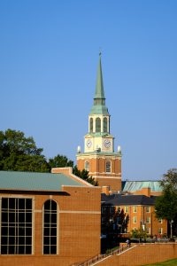 The bell tower of Wait Chapel rises over the Wake Forest campus early on the morning of Tuesday, October 6, 2020.
