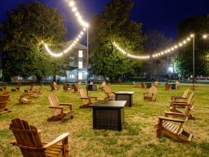 Propane fire pits and Adirondack chairs are set up on Manchester Plaza on Friday, January 22, 2021. The area will be used for safely distanced student life programming during the winter.