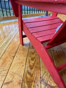 ice has melted from the adirondack chair