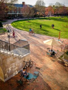 Wake Forest students enjoy a warm early spring afternoon on Hearn Plaza, on the campus of Wake Forest University, Thursday, March 28, 2019.