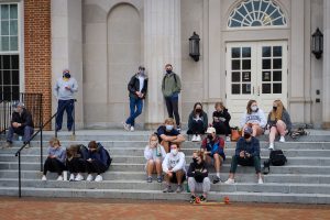 students gather on the steps of Farrell Hall to watch the Blackhawks