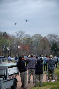 lots of onlookers watch the Blackhawks arrival