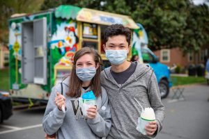 Two students pose for a photo - Wake Forest hosts its first ever WakeChella featuring Wiz Khalifa on Manchester Plaza on Saturday, April 17 2021.