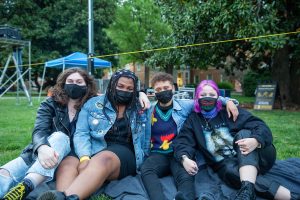 Wake students hug each other for a photo at Wakechella