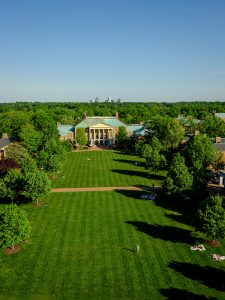 Wake Forest students study and hang out on Hearn Plaza on a beautiful spring afternoon