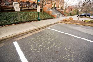 The Wake Forest Alma Mater is written in chalk in a parking space outside the Benson University Center on Wednesday, February 6, 2008.
