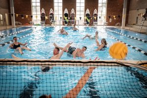 Members of the Wake Forest community attend the opening of phase 3 of the Reynolds Gym renovation on Wednesday, March 28, 2018. A tough water polo match in the new pool.